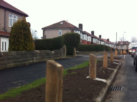 Wooden bollards installed on Stephen Hill