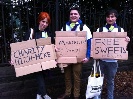 Sheffield students hitch hiking through Crosspool yesterday