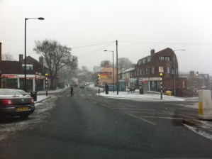 Saturday lunchtime: snow starts to fall in Crosspool precinct