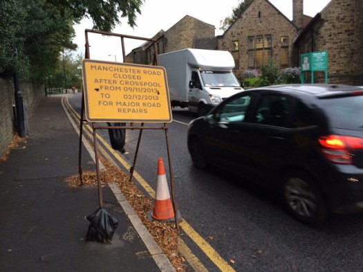 Sign warning motorists of A57 Manchester Road repairs