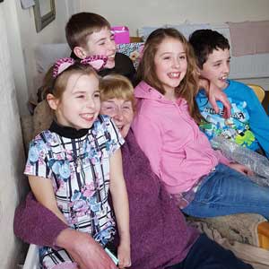 Children's author Ann Twigg with her grandchildren