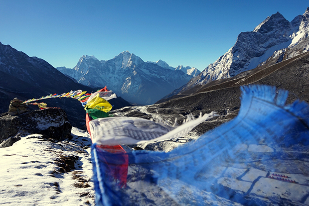 3. Prayer flags fluttering in the wind over the Gokyo Valley in the Himalayas