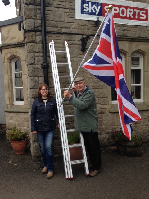 Putting flags up in the precinct